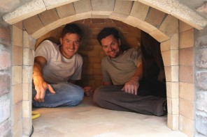 George Pascoe and brother-in-law and business partner James Martin sitting in our new wood oven